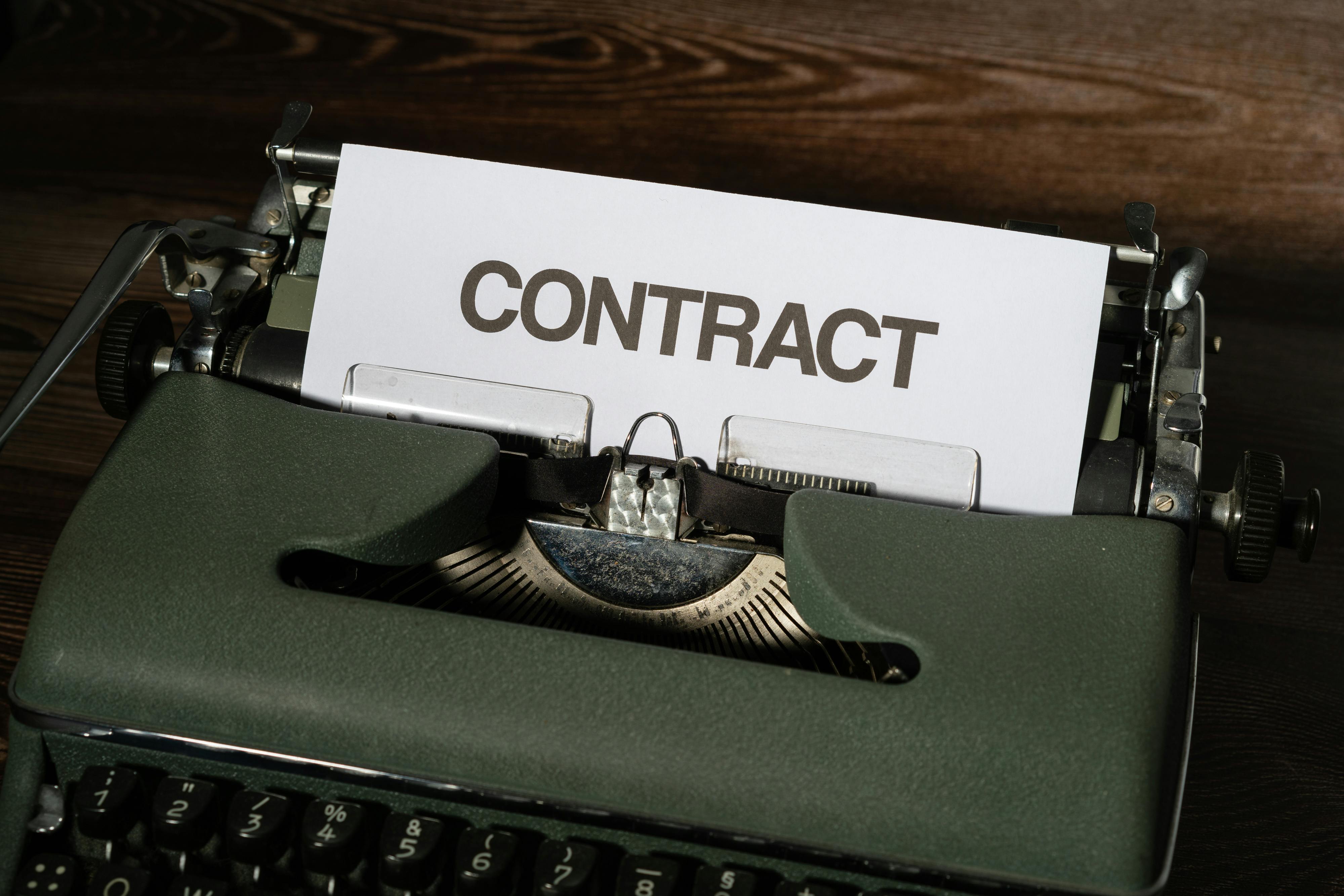Dutch employment contract Netherlands expat reviewing clauses 2026